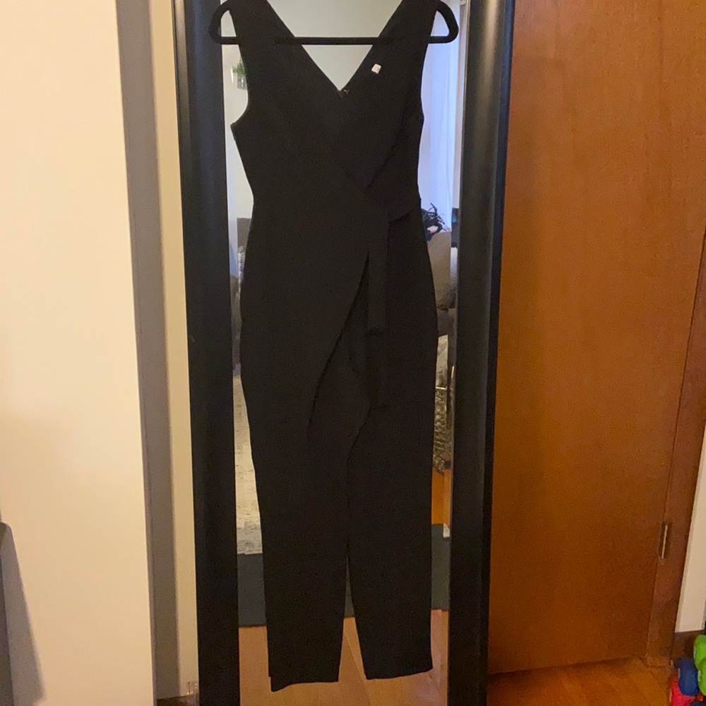 BCBG size 0 black jumpsuit romper. Wrap tie